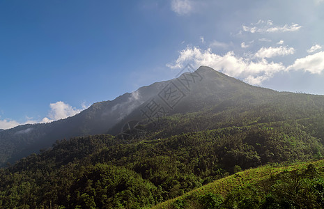 日落时山岳蓝色阳光土地日出太阳世界首脑季节风景场景背景图片