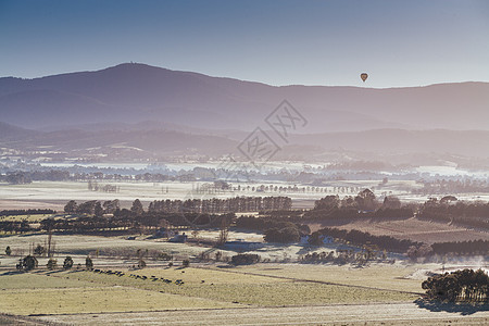 澳洲日出时热气球太阳天空旅行空气漂浮娱乐航班爬坡场地乐趣图片
