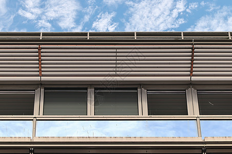 带玻璃和反射阳光的现代办公楼立面金融天空蓝色建筑物摩天大楼中心技术市中心城市建筑学图片