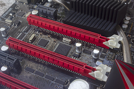 Pci Express插槽红色 用于视频图形卡VGA卡 O晶体管半导体电脑记忆母板电气技术工程连接器木板背景图片