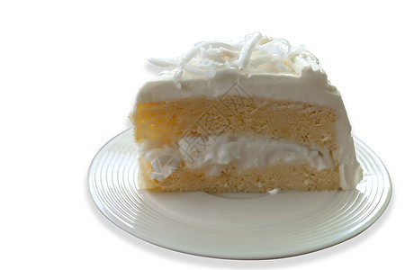 椰子奶油蛋糕 白面包上的顶部隔离带有切片的椰子图片
