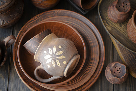 彩色手工制陶瓷粘土 棕色花岗岩杯 板块 碗图片