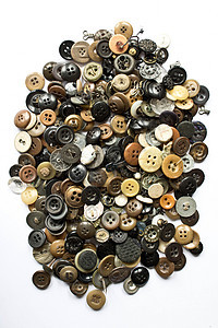 多色不同尺寸按钮的集合绿色纽扣纺织品裁缝衣服收藏塑料工艺圆形圆圈背景图片