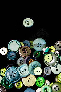 多色不同尺寸按钮的集合工艺裁缝收藏绿色纺织品白色缝纫圆圈纽扣红色图片