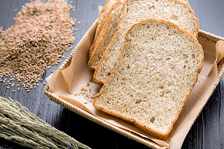 全麦面包切片全麦面包全麦面包小麦粮食食物糖类化合物碳水杂粮面包早餐背景图片