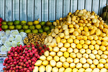 旅游 芒果 橙 龙贡 洛的街头市场水果奇异果异国桂圆香蕉热带情调橙子石榴柠檬蔬菜图片