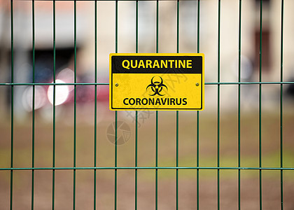 表面绿色的装饰性金属铁丝网围栏风险标签生物疾病警报冒险警告城市安全感染图片