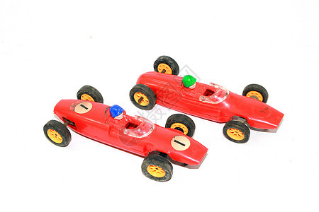 儿童玩具赛车在白落后地区玩的老式儿童玩具比赛车车轮公式速度驾驶红色孩子们收藏品运输跑车发动机背景图片