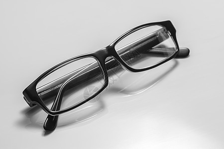 各种家用物品的成品摄影场景塑料近视玻璃框架白色眼睛主题宏观眼镜图片