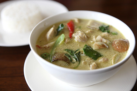泰国食鸡绿咖咖咖 有木本米胡椒美食木头柠檬树叶盘子椰子厨房牛奶辣椒图片