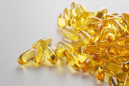 维生素补充阿梅加3药丸凝胶白色宏观药店黄色医疗鱼油药片药物药品图片