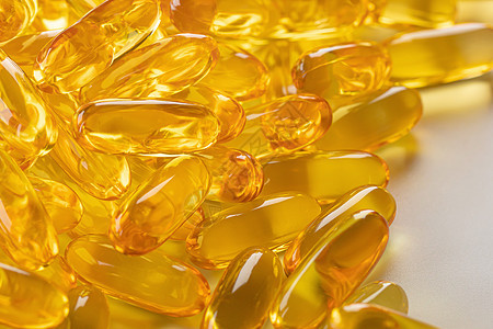 维生素补充阿梅加3药丸凝胶鱼油医疗药品饮食黄色药店白色宏观药片图片