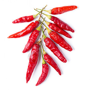 在白色背面隔离的红辣椒干或辣辣椒团体红色胡椒寒冷食物香料薄片蔬菜美食烹饪图片