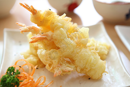 炸毛Temurura 炸虾日日式食物海鲜小吃午餐筷子饮食餐厅金子蔬菜竹子背景