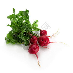 在白色背景上隔离的新鲜成熟的萝卜水果紫色食物蔬菜沙拉植物圆形块茎收成红色图片
