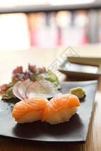 沙门寿司小吃寿司海鲜筷子木头食物美食饮食午餐美味图片