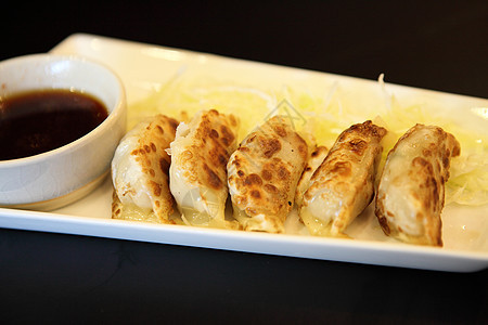 Gyoza 青沙食物猪肉午餐烹饪营养宏观饺子餐厅盘子竹子图片