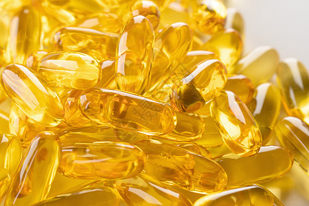 维生素补充阿梅加3药丸药品凝胶药物药店宏观黄色鱼油白色药片饮食图片
