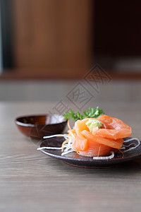 生鱼鱼肉饮食沙拉寿司文化橙子木头食物美味午餐鱼片图片