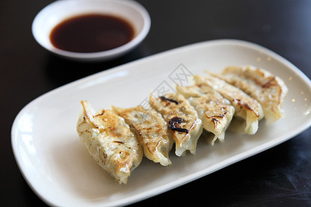 Gyoza 青沙洋葱食品食物盘子蔬菜营养油炸点心水饺猪肉图片