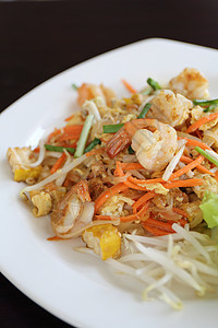 泰国食用泥薯炸面条和虾豆芽花生软垫国王蔬菜小吃面条街道美食柠檬图片