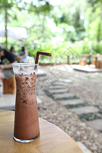 咖啡冰冰雪巧克力食物假期织物饮料饮食奶油稻草液体热带蓝色背景