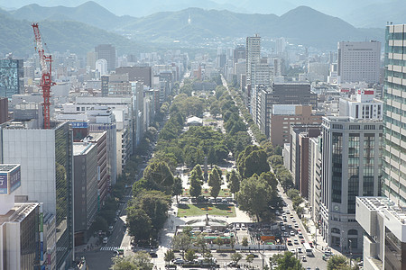 日本札幌市中心城市风景旅行商业游客办公室地标城市景观天际场景山脉图片