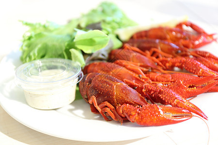 煮煮龙虾柠檬螃蟹营养午餐餐厅红色海鲜小吃甲壳食物图片