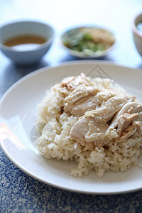 外海鸡米 黄瓜和泰国食物烹饪午餐文化盘子木头早餐餐厅辣椒美食蒸汽图片