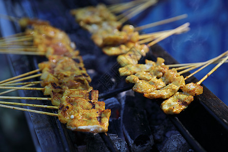 烧煤炉 亚洲食物牛肉盘子花生马来语烹饪猪肉炙烤小吃午餐市场图片