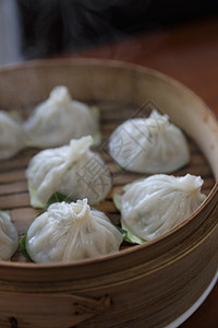 竹篮 中国菜的酱面粉用餐篮子烹饪盘子水饺餐厅食物美食小吃包子图片