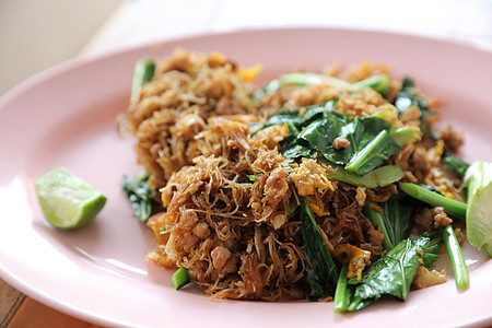 黑酱油炸面条 吃黑豆酱油炸软垫盘子蔬菜烹饪洋葱面条大豆食物餐厅图片