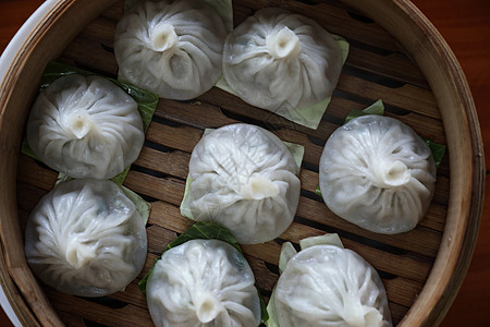 竹篮 中国菜的酱面粉美食餐厅包子筷子水饺饺子篮子盘子蒸汽猪肉图片