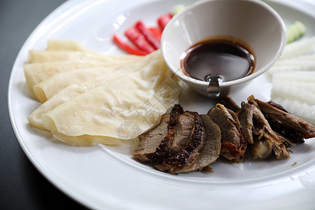 北京鸭 中国菜烹饪盘子蔬菜食物食谱煎饼皮肤油炸海辛家禽图片