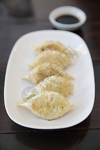 Gyoza 青沙水饺洋葱油炸白色美食食物餐厅盘子猪肉食品图片