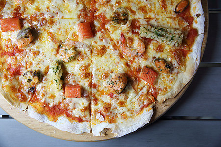 披萨比萨海鲜馅饼乌贼糕点蔬菜火腿小吃餐厅食物用餐美食图片