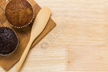 咖啡时间蛋糕背景的 Cupcake杯子小吃时光面包甜点食物木头休闲美食图片