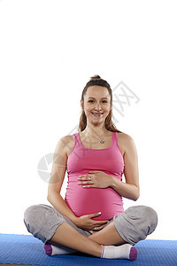 处于职位位置的怀孕妇女女性母性福利身体黑发女士保健白色母亲孩子图片