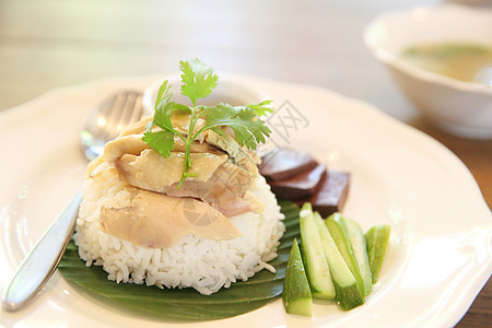 泰国食品美食鸡肉和大米煮沸男人食物盘子午餐黄瓜文化饮食烹饪香菜图片