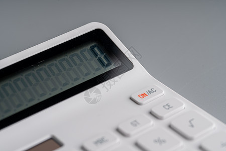 教育业务 co 的灰色背景上的白色计算器黑色商业会计金融办公室数字平衡工具塑料电子图片