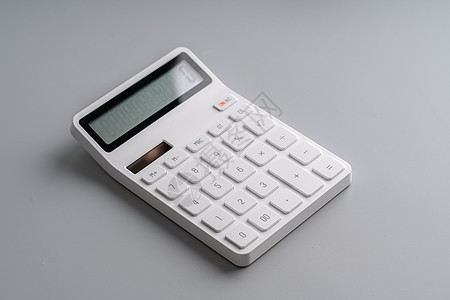 教育业务 co 的灰色背景上的白色计算器经济工具按钮商业数数电子塑料展示数学数字图片