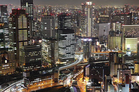 日本大阪市夜景时的城市风景地标市中心建筑学商业旅游办公室天线旅行摩天大楼全景图片