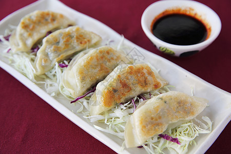 Gyoza 青沙水饺点心午餐食品蔬菜盘子洋葱营养白色餐厅图片