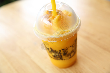 芒果frappe果汁冰沙美食玻璃营养热带饮料奶昔黄色橙子叶子图片