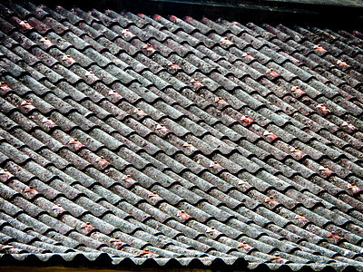 古老roo的侵蚀和锈蚀材料技术平铺墙纸瓦楞金属栅栏橙子机库瓷砖图片
