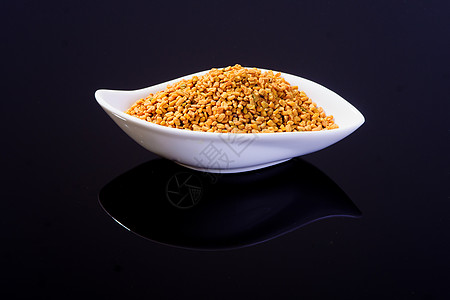 Fenugreek 种子黑色美食烹饪茴香芳香食物白色香料黄色草本植物图片