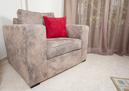 沙发在客厅家具装饰软垫风格椅子长椅棕色红色设计窗户图片