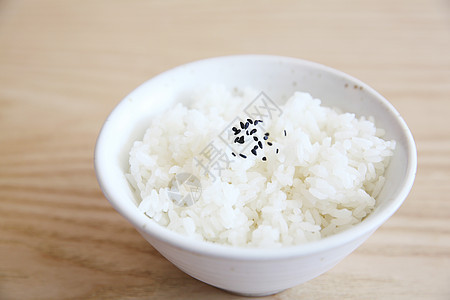 以木柴为背景的稻米谷物饮食棕色文化烹饪粮食香米午餐美食食物图片