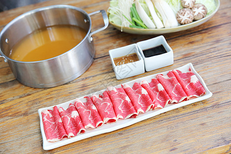 牛肉shabu shabu白色餐厅蔬菜牛肉美食烹饪食物红色盘子猪肉图片