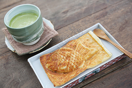 青茶大木 加绿茶棕色小吃果子美食蛋糕食物糖果鱼形饼子甜点图片